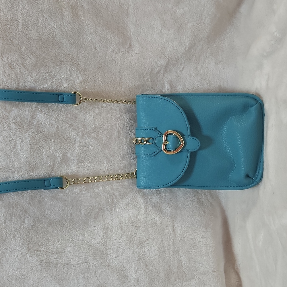 Juicy Couture Unchain my heart Cellie Turquoise Mini crossbody bag.